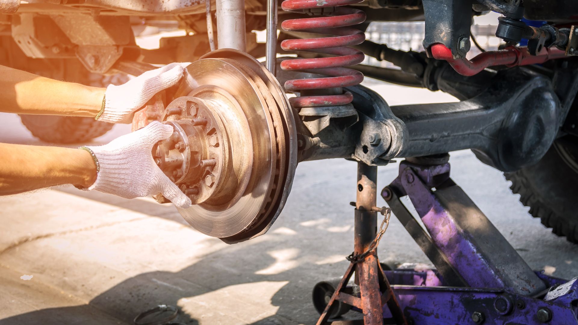 A close up of a vehicle's front suspension